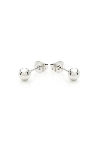 Pair of silver ball earrings on a white background