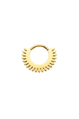 Gold hoop earring with sunburst design on a white background