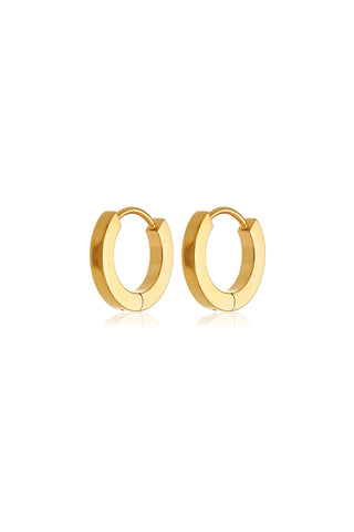 Gold hoop earrings on a white background