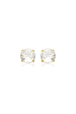 Pair of gold earrings with clear gemstones on a white background