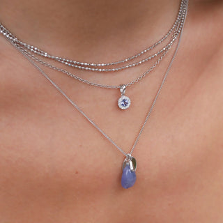 rose cut tanzanite pendant and tanzanite and diamond pendant