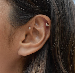 gold cz triangle cartilage stud and start cartilage earring in ear