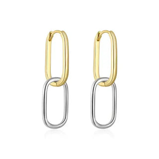 Two tone drop earrings with a gold oval link at the top and a silver oval link hanging below
