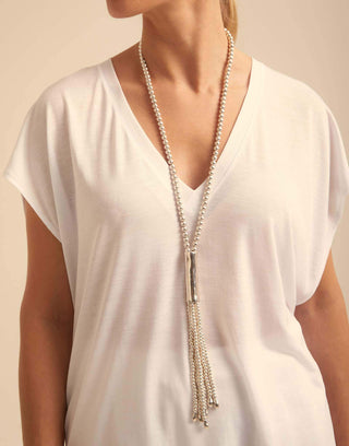 Uno de 50 Jellyfish necklace draped to show its full length and bead detail