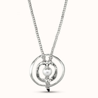 An unode50 silver colour pendant necklace featuring a central white pearl suspended between two interlocking polished rings on a beaded chain, set against a solid off-white background.