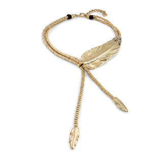 Uno de 50 Golden Feather necklace laid flat, showing gold-plated chain with feather charm detail