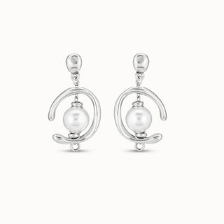 Pair of unode50 silver tone drop earrings with pearls on a white background