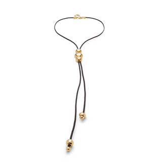 Necklace with gold clasp and beads on a white background