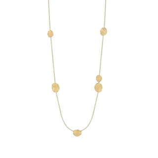 Gold necklace with small round beads on a white background