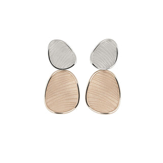 Pair of earrings with two-tone design on a white background