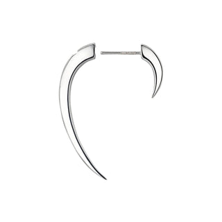 Silver hoop earrings on a light gray background